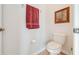 Clean and bright toilet room with a wall-mounted towel rack at 1004 Costa Mesa Ln, Kissimmee, FL 34744