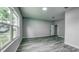 Bright bedroom featuring large windows for natural light and ample space at 1013 Cannes Dr, Kissimmee, FL 34759