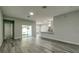 Spacious living room with sliding glass doors leading to the outdoors, offering lots of natural light at 1013 Cannes Dr, Kissimmee, FL 34759