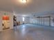 Spacious two car garage with washer and dryer hookups, and an abundance of storage space at 103 W Maple St, Davenport, FL 33837