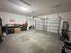Spacious two-car garage with ample room for storage, complete with garage door opener at 1220 Hilltop Pl # 1220, St Cloud, FL 34772