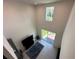 This view from above showcases the living room, featuring an open patio through a large glass slider at 1220 Hilltop Pl # 1220, St Cloud, FL 34772