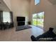 Bright living room with large sliding doors opening to the backyard and comfortable seating at 1220 Hilltop Pl # 1220, St Cloud, FL 34772