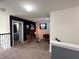 Upstairs living room featuring modern decor and stylish seating area at 1220 Hilltop Pl # 1220, St Cloud, FL 34772