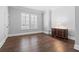 Bedroom featuring hardwood floors, natural light, and traditional decor, creating a relaxing atmosphere at 1251 Aquila Loop, Celebration, FL 34747