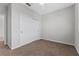 Bedroom includes neutral carpeting and a closet at 1251 Aquila Loop, Celebration, FL 34747