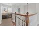 Upstairs hallway with desk area and window at 1251 Aquila Loop, Celebration, FL 34747