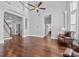 Spacious home with hardwood floors, a staircase, and a sitting area, creating a welcoming and elegant atmosphere at 1251 Aquila Loop, Celebration, FL 34747