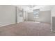 Large carpeted loft featuring neutral paint, lots of natural light, and an open floor plan at 1251 Aquila Loop, Celebration, FL 34747