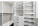 Spacious walk-in closet features built-in shelving and ample storage space at 1251 Aquila Loop, Celebration, FL 34747