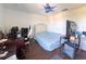 Bedroom with laminate floors, white walls, and a ceiling fan at 1336 Lattimore Dr, Clermont, FL 34711