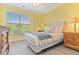 Serene bedroom with a plush bed, a bright window, and tasteful decor at 1370 Tuscana Ln # 5406, Davenport, FL 33896