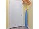 This closet features an ironing board and plenty of storage space with hangers on the rack at 1370 Tuscana Ln # 5406, Davenport, FL 33896