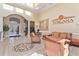 Elegant lobby area featuring high ceilings, travertine floors, comfortable seating, and Toscana branding at 1370 Tuscana Ln # 5406, Davenport, FL 33896