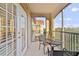 Outdoor patio with seating offers serene views of the surrounding landscape at 1370 Tuscana Ln # 5406, Davenport, FL 33896