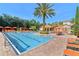 Stunning pool area with lounge chairs and umbrellas, perfect for relaxation and leisure at 1370 Tuscana Ln # 5406, Davenport, FL 33896