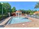 Fun splash pad with a central fountain and seating areas, perfect for Gathering entertainment at 1370 Tuscana Ln # 5406, Davenport, FL 33896
