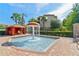 Relaxing community water feature and splash pad with a charming gazebo and well-maintained landscaping at 1370 Tuscana Ln # 5406, Davenport, FL 33896