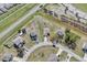 Aerial view of a residential neighborhood, showcasing well-maintained homes and green spaces at 139 Columbia Dr, Poinciana, FL 34759
