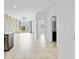 Bright and spacious open floorplan with tile flooring and sliding glass doors leading to the backyard at 139 Columbia Dr, Poinciana, FL 34759