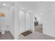 Modern bathroom with tiled floors, a glass-enclosed shower, and a separate toilet for convenience at 1431 Lassen St, Haines City, FL 33844