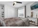 Comfortable bedroom featuring neutral decor, a ceiling fan, natural light, and closet at 1431 Lassen St, Haines City, FL 33844