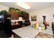 Stylish kitchen with granite countertops, stainless steel sink, modern appliances, dark cabinets, and decorations at 1615 Reflection Cv, St Cloud, FL 34771