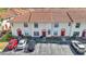 The two-story townhomes boast red-tiled roofs, assigned parking, and well-kept landscaping at 1631 Little Falls Cir # 92, Orlando, FL 32807