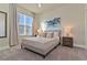 Comfortable bedroom with neutral tones, soft carpet, and ample natural light at 17220 Blessing Dr, Clermont, FL 34714