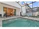 Private pool featuring lounge chairs and view of the house at 17220 Blessing Dr, Clermont, FL 34714
