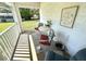Cozy front porch featuring comfortable seating, perfect for relaxing and enjoying the outdoors at 224 Montana Ave, St Cloud, FL 34769