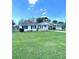 Charming single-story home with a well-maintained lawn, carport, and inviting front porch at 224 Montana Ave, St Cloud, FL 34769