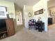 Inviting hallway with neutral walls, cozy carpet, and accent furniture to provide a warm welcome at 224 Montana Ave, St Cloud, FL 34769