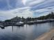View of the marina with boats docked, showcasing waterfront lifestyle and recreational boating opportunities at 224 Montana Ave, St Cloud, FL 34769