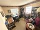 Functional office space with a large desk, ample storage, and comfortable seating at 224 Montana Ave, St Cloud, FL 34769