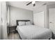 Cozy bedroom with a bed, side table, and a spacious closet at 2313 Duncan Trl, Clermont, FL 34714