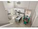 Spacious kitchen with stainless steel appliances, marble countertops, and an island with barstool seating at 2313 Duncan Trl, Clermont, FL 34714