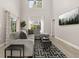 Bright living room with high ceilings, plush gray sectional, and a large television above a geometric rug at 2313 Duncan Trl, Clermont, FL 34714