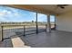Expansive balcony with tile flooring and scenic golf course views, perfect for outdoor relaxation and enjoyment at 2375 Pinehurst Ct, Davenport, FL 33837