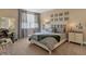 Bedroom showcasing a comfortable bed and stylish décor, creating a relaxing ambiance at 2375 Pinehurst Ct, Davenport, FL 33837