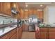 Well-equipped kitchen with stainless steel appliances and granite countertops at 2375 Pinehurst Ct, Davenport, FL 33837