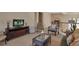 Comfortable loft with media center, chairs, and woven coffee table at 2375 Pinehurst Ct, Davenport, FL 33837