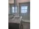 Modern bathroom with marble countertop, glass-enclosed shower, and elegant fixtures at 2438 Winfield Dr, Kissimmee, FL 34743