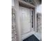 Close-up of the front door with brick columns on both sides at 2438 Winfield Dr, Kissimmee, FL 34743