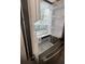 Modern stainless steel refrigerator featuring adjustable shelves and ample storage space at 2438 Winfield Dr, Kissimmee, FL 34743