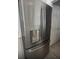 Stainless steel refrigerator with built in water dispenser at 2438 Winfield Dr, Kissimmee, FL 34743