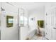 Bathroom area with a glass shower and separate tub, plus decorative accents at 2539 Jasmine Trace Dr, Kissimmee, FL 34758