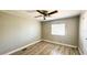 Bedroom with wood floor and window allowing natural light at 2601 Salina Way, Kissimmee, FL 34758