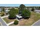 Exterior shot of a single story home, with mature landscaping on a corner lot at 2601 Salina Way, Kissimmee, FL 34758