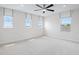 Large bedroom with carpet and lots of light at 276 Hilltop Bloom Loop, Haines City, FL 33844